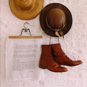 Really rare woven Justin boots. Fits a 7.